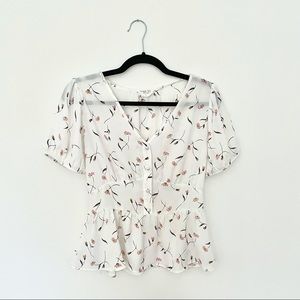Delicate peplum floral blouse